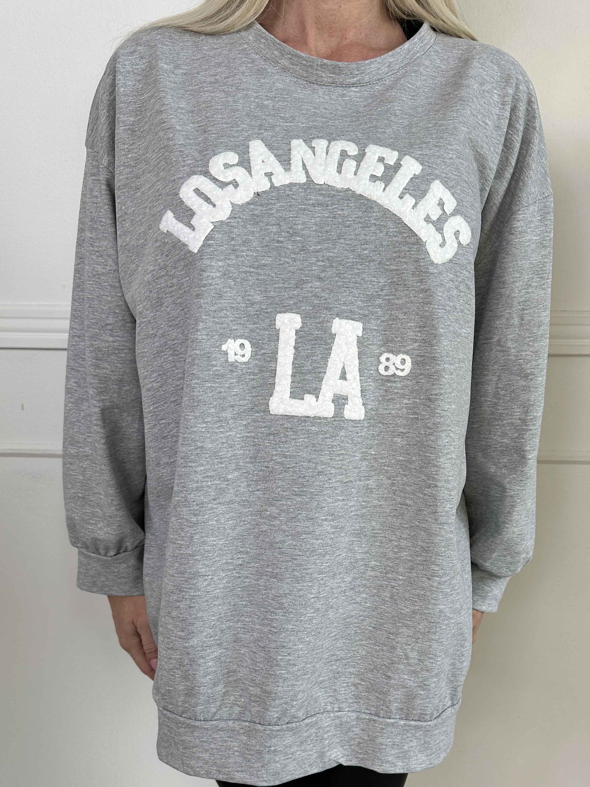 Magnolia - Sweatshirt med LA skrivet i plysch